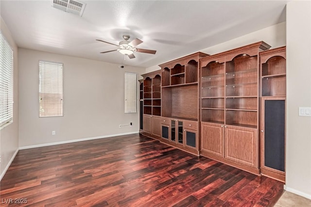 10584 Peach Creek St, Las Vegas, NV 89179 - spare room featuring a ceiling fan and dark wood finished floors