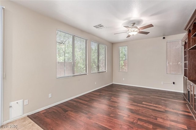 10584 Peach Creek St, Las Vegas, NV 89179 - empty room featuring dark wood-type flooring and a ceiling fan