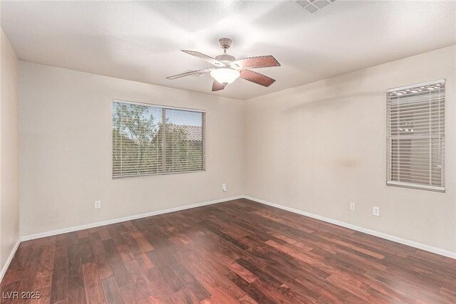 10584 Peach Creek St, Las Vegas, NV 89179 - empty room with dark wood finished floors and ceiling fan