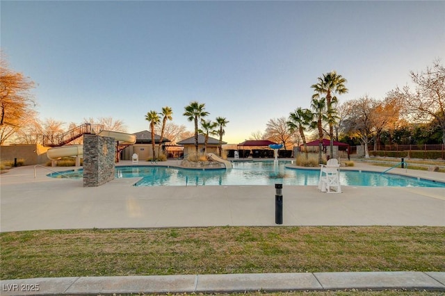 10198 Timber Willow Ave, Las Vegas, NV 89135 - community pool with a patio