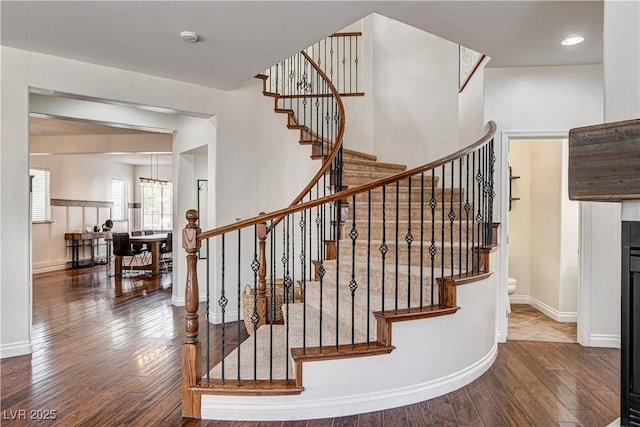 1717 Jake Andrew Ave, North Las Vegas, NV 89086 - staircase with wood-type flooring and baseboards