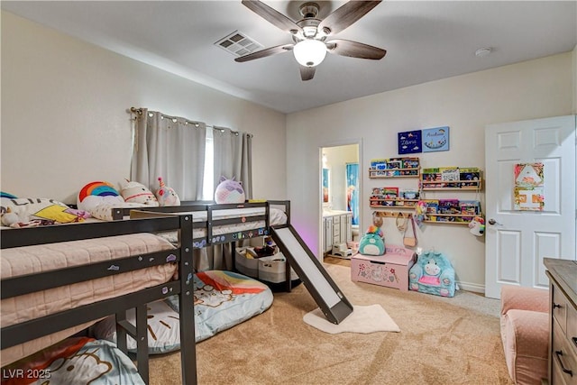 1717 Jake Andrew Ave, North Las Vegas, NV 89086 - carpeted bedroom with ensuite bath and a ceiling fan