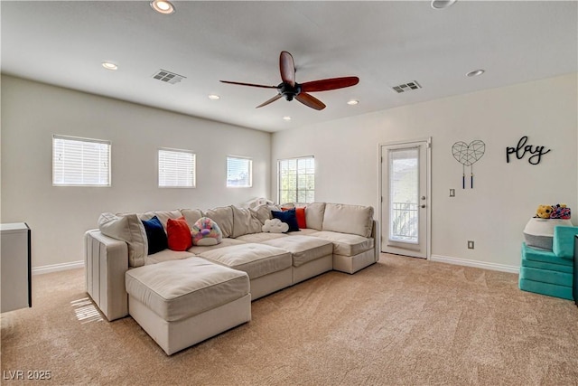 1717 Jake Andrew Ave, North Las Vegas, NV 89086 - living area featuring light carpet, a ceiling fan, and recessed lighting