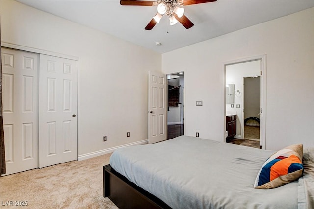 1717 Jake Andrew Ave, North Las Vegas, NV 89086 - carpeted bedroom featuring ensuite bath, a closet, and a ceiling fan