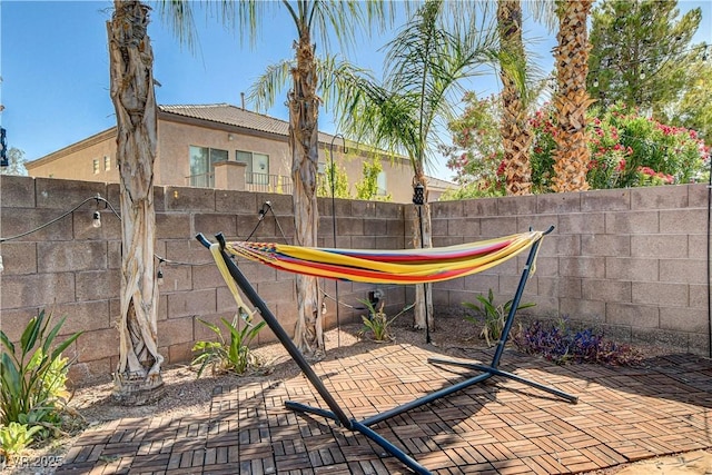 1717 Jake Andrew Ave, North Las Vegas, NV 89086 - fenced backyard featuring a patio
