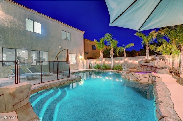 1717 Jake Andrew Ave, North Las Vegas, NV 89086 - pool at twilight with a patio area and a pool with connected hot tub