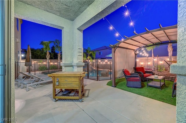 1717 Jake Andrew Ave, North Las Vegas, NV 89086 - patio at twilight with a patio area, a pergola, and a fenced backyard