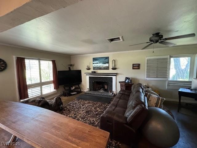 632 Tam O Shanter, Las Vegas, NV 89109 - living area with crown molding, a brick fireplace, and a ceiling fan