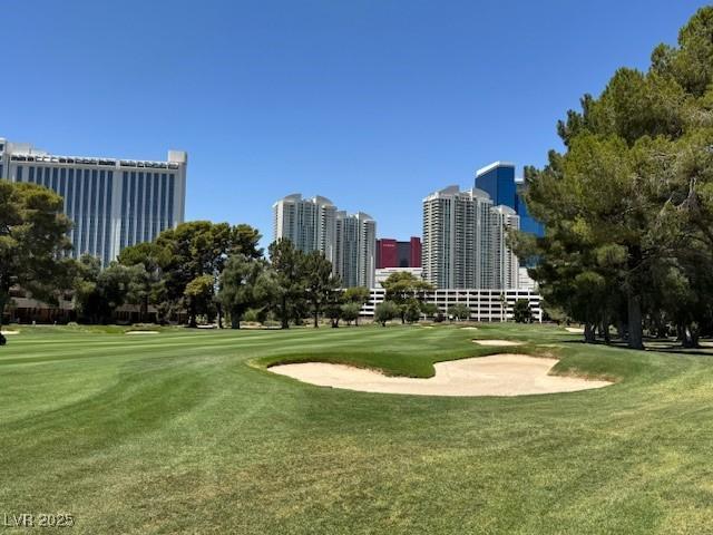 632 Tam O Shanter, Las Vegas, NV 89109 - view of community featuring golf course view, a yard, and a city view
