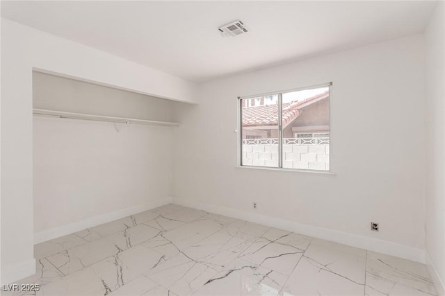 3826 Edmond St, Las Vegas, NV 89103 - unfurnished room with light marble finish flooring and baseboards