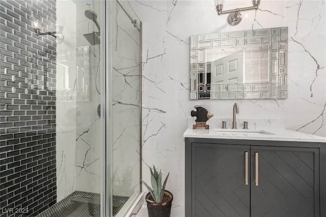 3826 Edmond St, Las Vegas, NV 89103 - bathroom featuring a marble finish shower and vanity