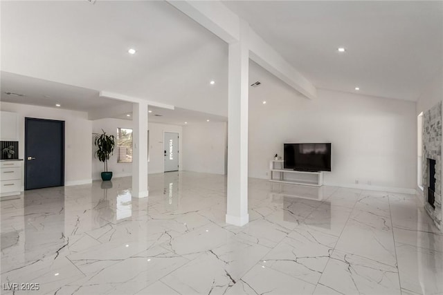 3826 Edmond St, Las Vegas, NV 89103 - unfurnished living room featuring a stone fireplace, light marble finish floors, vaulted ceiling, and recessed lighting