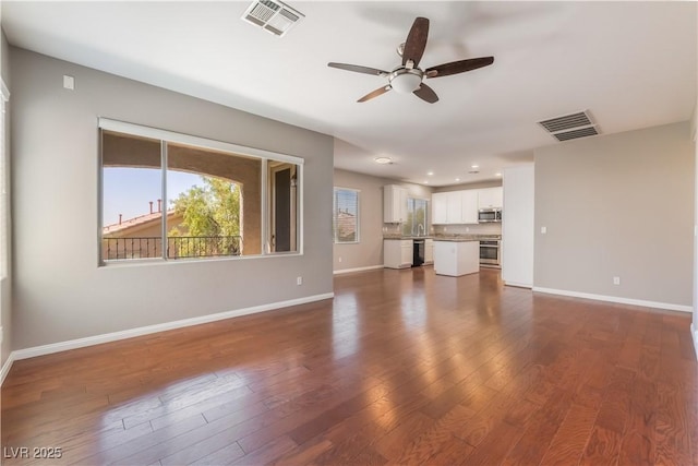 11901 Luna Del Mar Ln, Las Vegas, NV 89138 - unfurnished living room with ceiling fan, dark wood-style floors, and recessed lighting