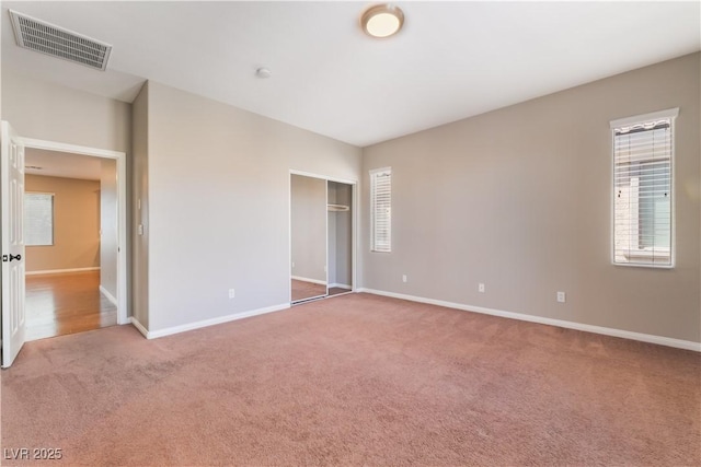 11901 Luna Del Mar Ln, Las Vegas, NV 89138 - unfurnished bedroom featuring carpet floors, multiple windows, and a closet