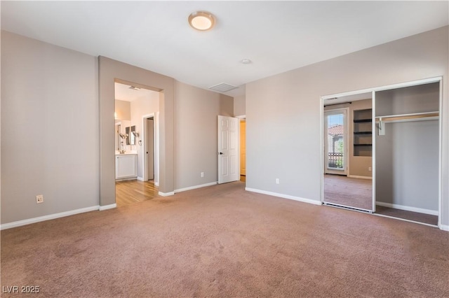 11901 Luna Del Mar Ln, Las Vegas, NV 89138 - unfurnished bedroom with carpet flooring, a closet, and ensuite bathroom
