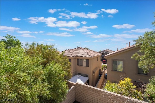 11901 Luna Del Mar Ln, Las Vegas, NV 89138 - rear view of house with stucco siding and a tile roof