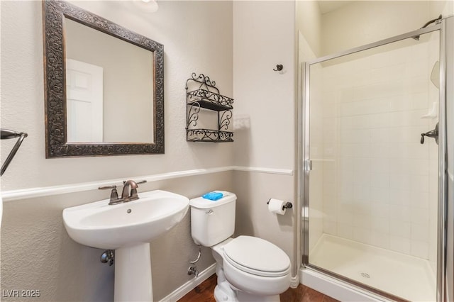 11901 Luna Del Mar Ln, Las Vegas, NV 89138 - bathroom featuring a stall shower and wood finished floors