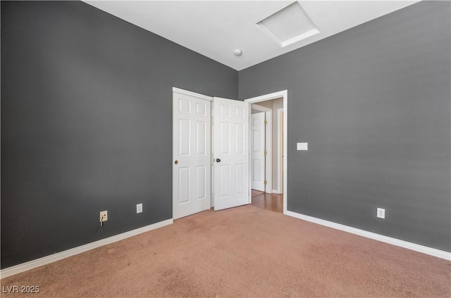 11901 Luna Del Mar Ln, Las Vegas, NV 89138 - unfurnished bedroom with attic access, carpet flooring, and a closet