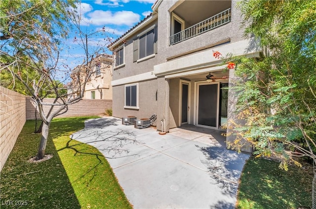 11901 Luna Del Mar Ln, Las Vegas, NV 89138 - entrance to property featuring stucco siding, a balcony, a ceiling fan, and a patio area
