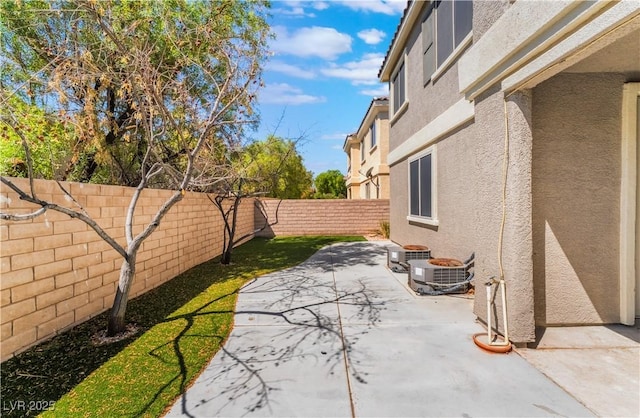 11901 Luna Del Mar Ln, Las Vegas, NV 89138 - fenced backyard featuring a patio