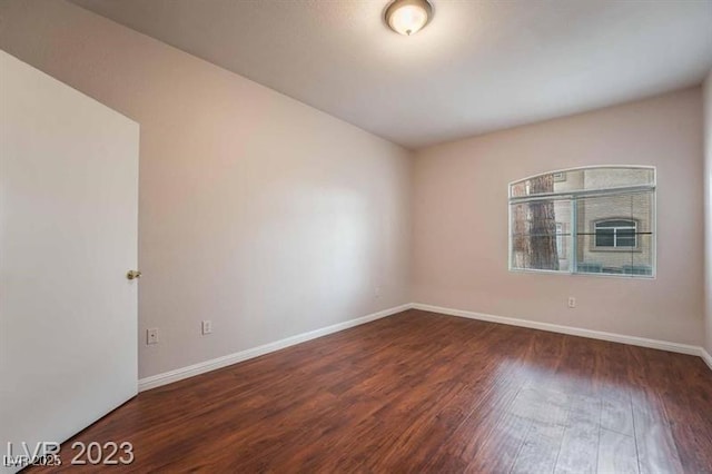 5415 W Harmon Ave Unit 1162, Las Vegas, NV 89103 - unfurnished room featuring wood finished floors and baseboards