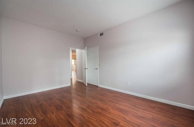5415 W Harmon Ave Unit 1162, Las Vegas, NV 89103 - empty room with wood finished floors and baseboards