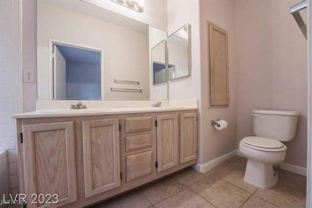 5415 W Harmon Ave Unit 1162, Las Vegas, NV 89103 - bathroom featuring double vanity and tile patterned floors