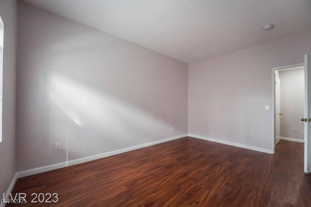 5415 W Harmon Ave Unit 1162, Las Vegas, NV 89103 - empty room with wood finished floors and baseboards