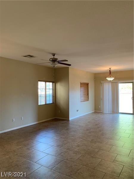 3813 Juanita May Ave, North Las Vegas, NV 89032 - spare room with baseboards and a ceiling fan