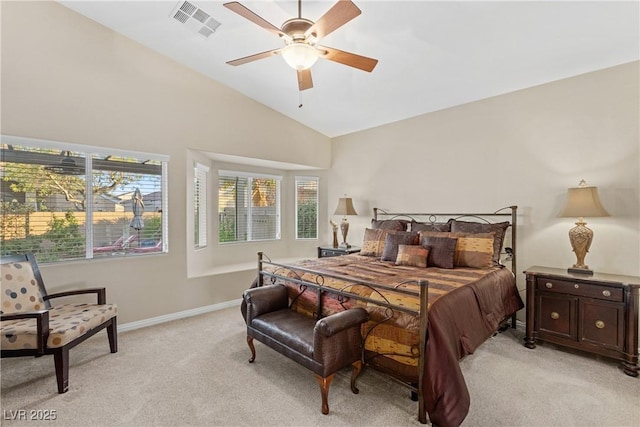 6413 White Tiger Ct, Las Vegas, NV 89130 - bedroom featuring light carpet, vaulted ceiling, and a ceiling fan