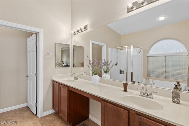 6413 White Tiger Ct, Las Vegas, NV 89130 - bathroom featuring double vanity, a stall shower, and tile patterned floors