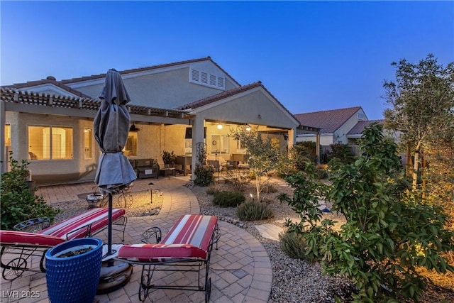 6413 White Tiger Ct, Las Vegas, NV 89130 - back of property with a patio and stucco siding