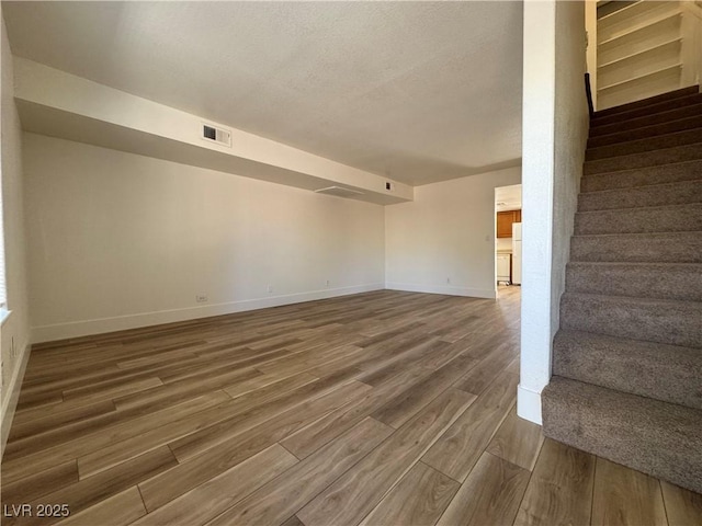 453 Las Casitas Way, Las Vegas, NV 89121 - stairway with wood finished floors and a textured ceiling