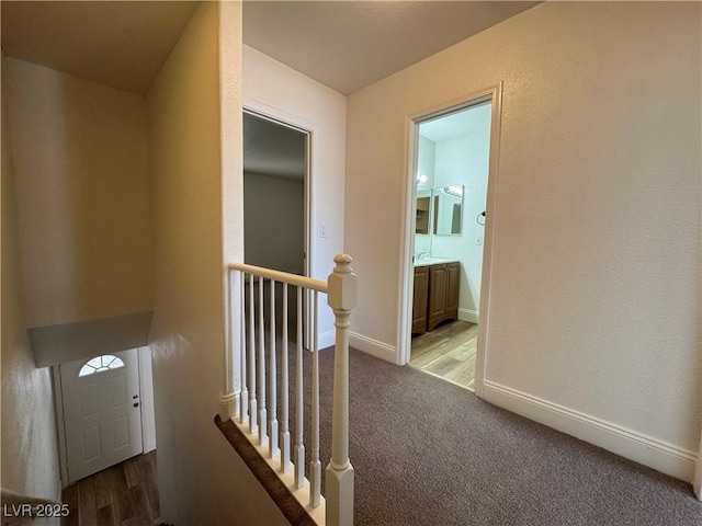 453 Las Casitas Way, Las Vegas, NV 89121 - hallway with an upstairs landing and carpet floors