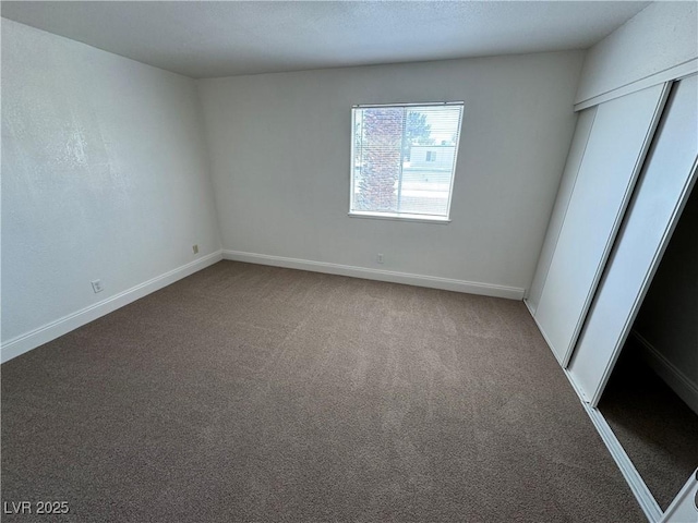 453 Las Casitas Way, Las Vegas, NV 89121 - unfurnished bedroom featuring carpet flooring and a closet