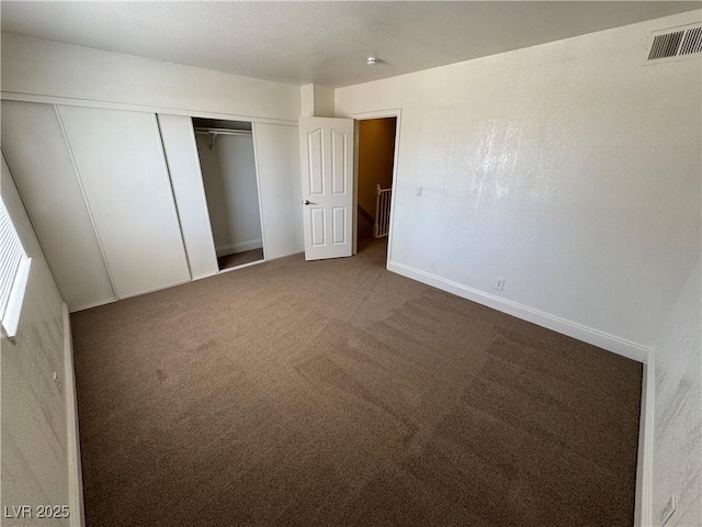 453 Las Casitas Way, Las Vegas, NV 89121 - unfurnished bedroom featuring carpet floors and a closet