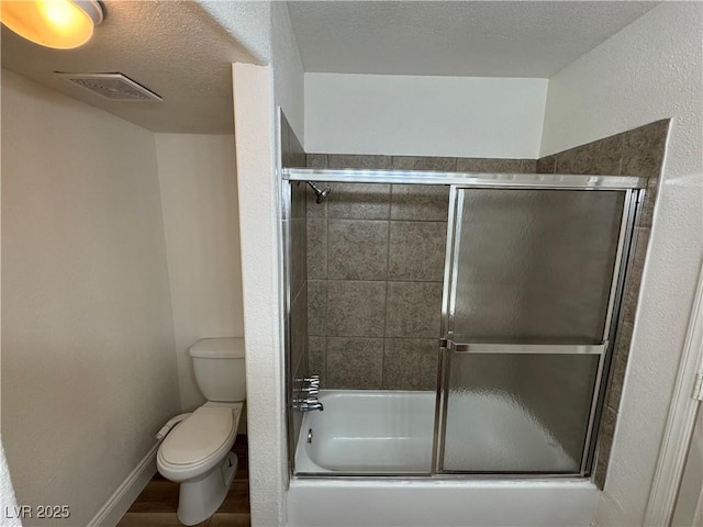 453 Las Casitas Way, Las Vegas, NV 89121 - bathroom featuring combined bath / shower with glass door and wood finished floors