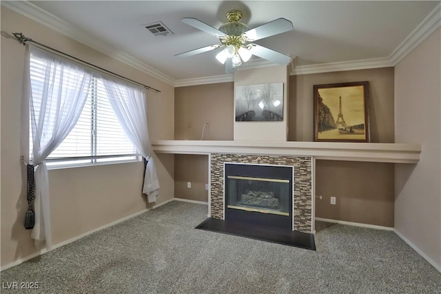 975 Leadville Meadows Dr, Henderson, NV 89052 - unfurnished living room featuring crown molding, ceiling fan, a tile fireplace, and carpet floors