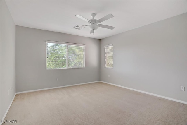 7263 Pepperbox Ave, Las Vegas, NV 89179 - spare room featuring ceiling fan and light colored carpet