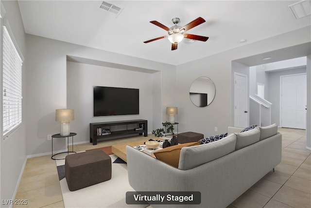 7263 Pepperbox Ave, Las Vegas, NV 89179 - living area with light tile patterned floors and ceiling fan