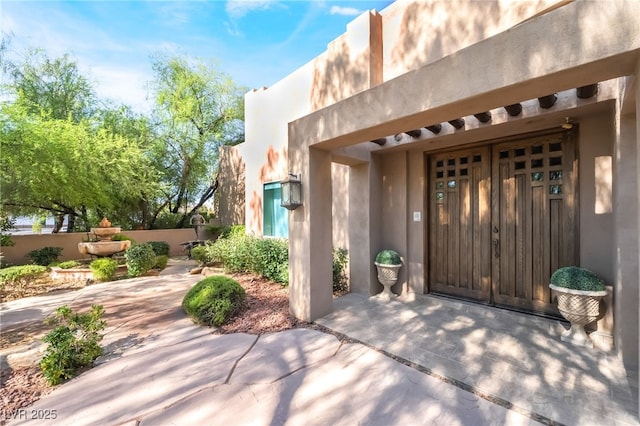 10445 Schirlls St, Las Vegas, NV 89141 - entrance to property featuring stucco siding