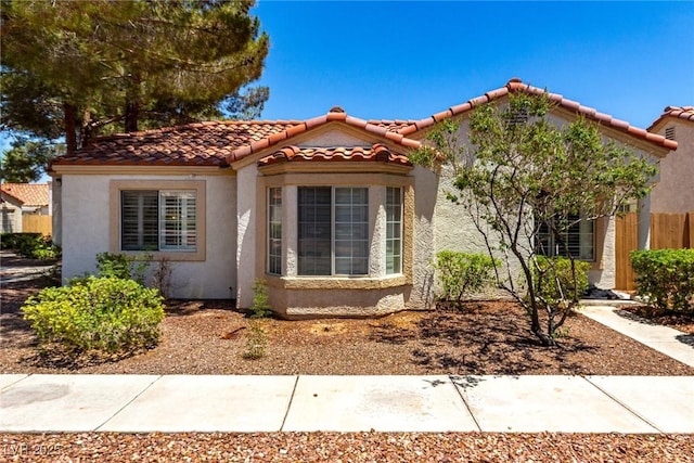 5424 Geneive Ln Unit 105, Las Vegas, NV 89108 - mediterranean / spanish-style home featuring stucco siding and a tile roof