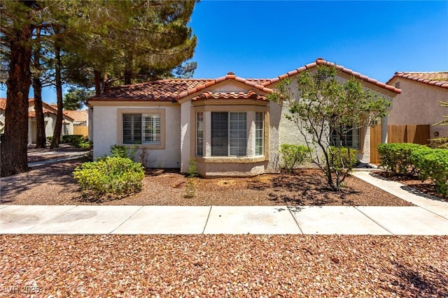 5424 Geneive Ln Unit 105, Las Vegas, NV 89108 - mediterranean / spanish-style house featuring stucco siding and a tile roof