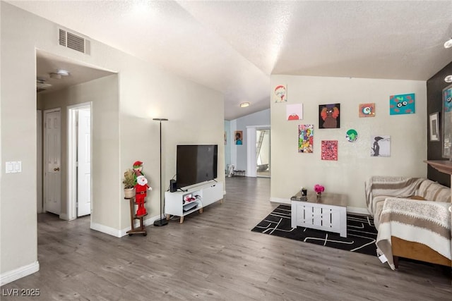 5424 Geneive Ln Unit 105, Las Vegas, NV 89108 - living room with wood finished floors and vaulted ceiling