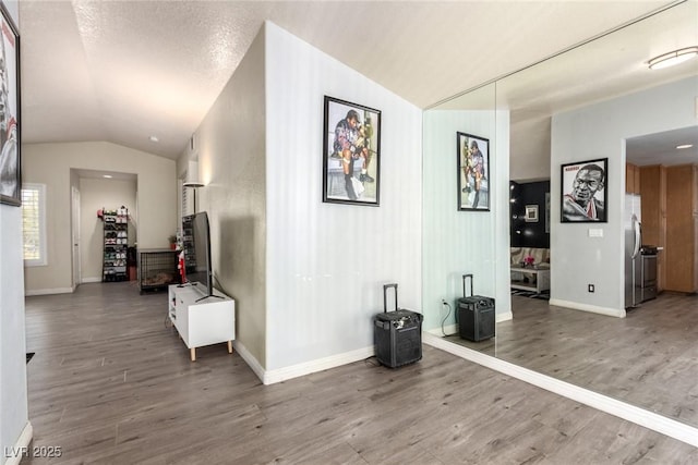 5424 Geneive Ln Unit 105, Las Vegas, NV 89108 - hall featuring wood finished floors and lofted ceiling
