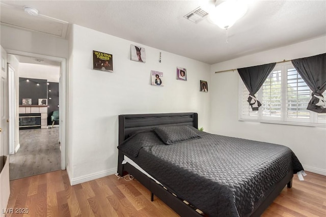 5424 Geneive Ln Unit 105, Las Vegas, NV 89108 - bedroom featuring wood finished floors