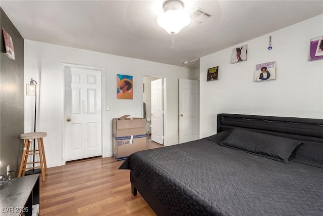 5424 Geneive Ln Unit 105, Las Vegas, NV 89108 - bedroom with light wood-style flooring