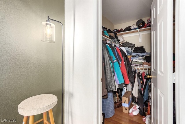 5424 Geneive Ln Unit 105, Las Vegas, NV 89108 - walk in closet featuring wood finished floors