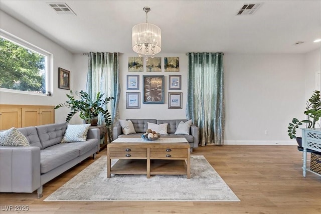 694 Value Ridge Ave, Henderson, NV 89012 - living area featuring a chandelier and light wood-style floors