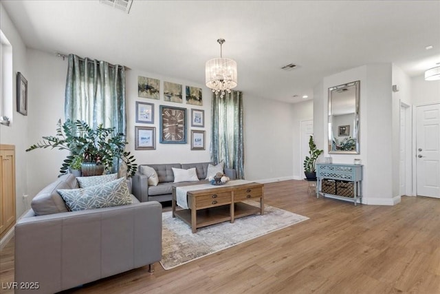 694 Value Ridge Ave, Henderson, NV 89012 - living room featuring light wood-style floors and a chandelier